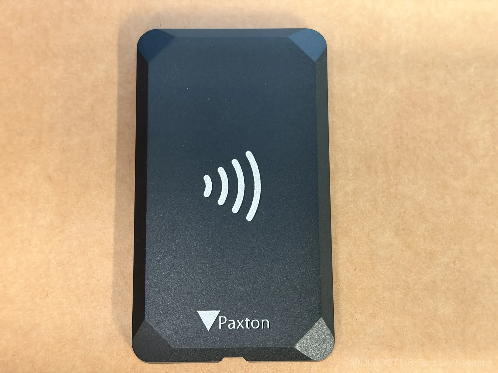 Paxton Solo NFC tag reader front view showing NFC symbol and Paxton logo